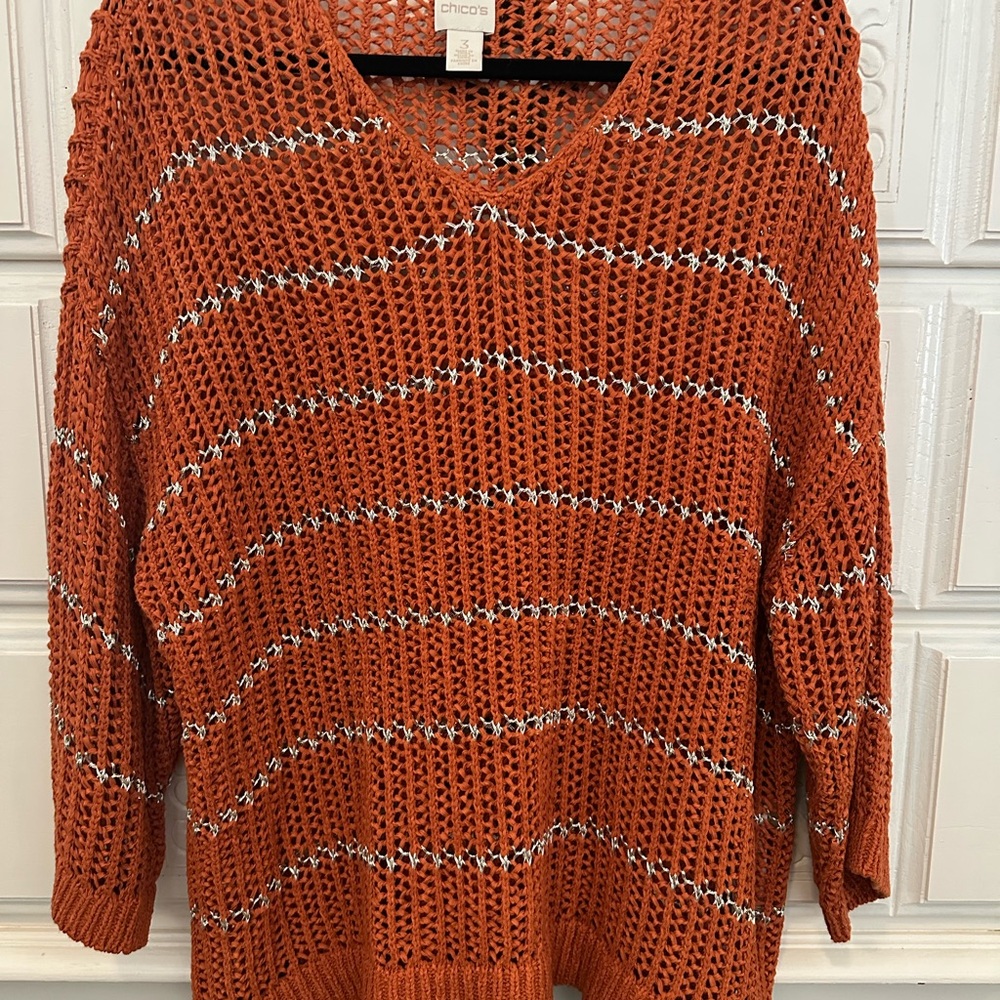 Orange and gold sweater